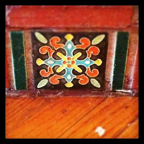 Colourful floral tile on a stair riser
