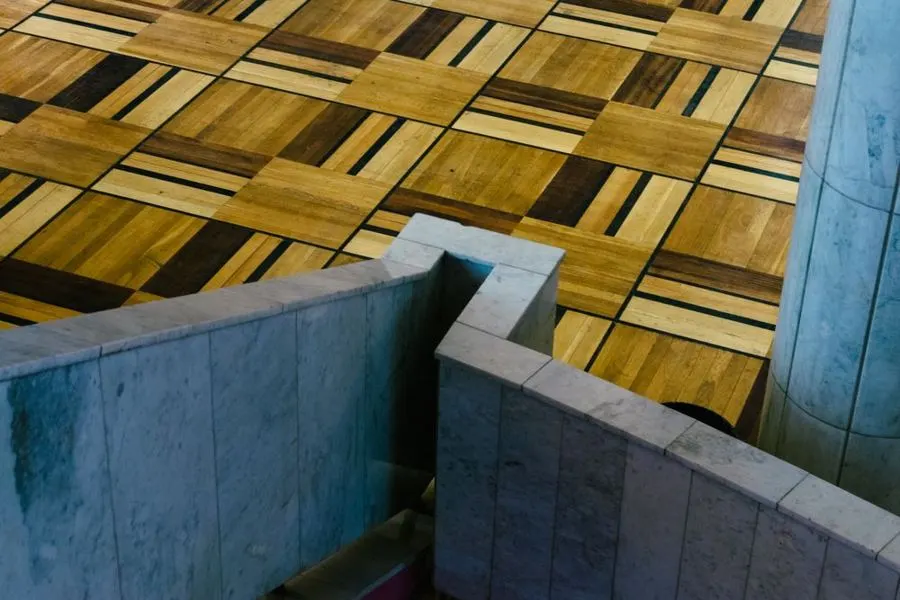 Small square timber-style floor blocks in a geometric arrangement