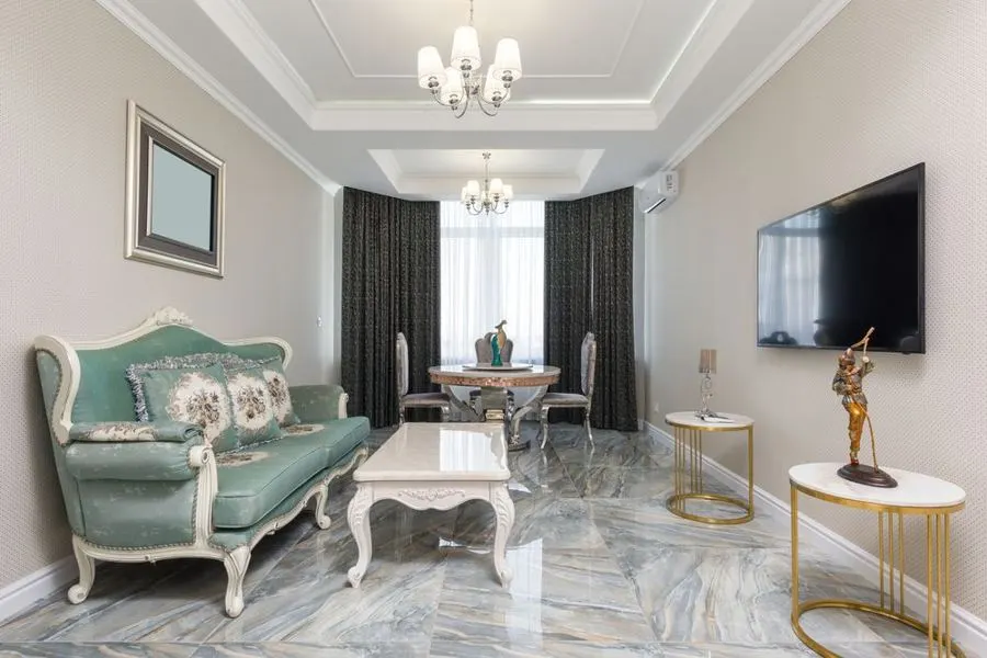 Living room with glossy grey marble-pattern flooring